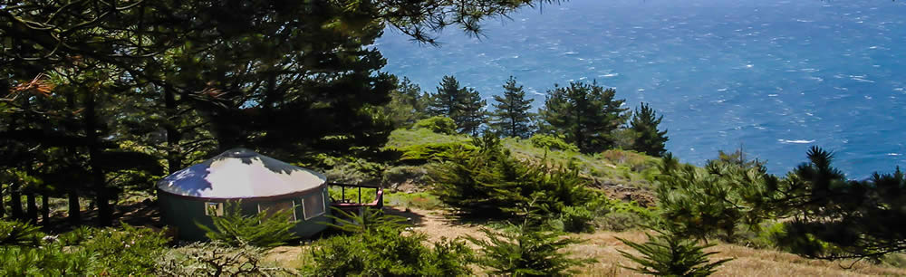 Picture of a yurt next to the ocean